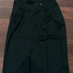 Black silk skirt. New with tags. Size medium